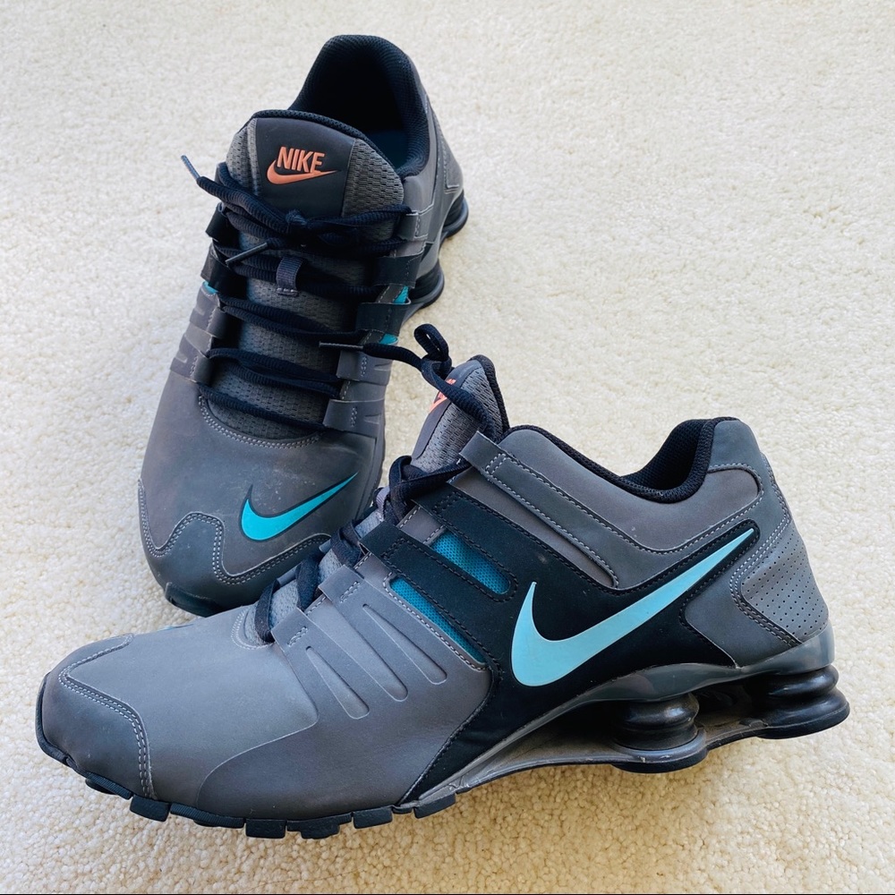 Grey nike shoes.